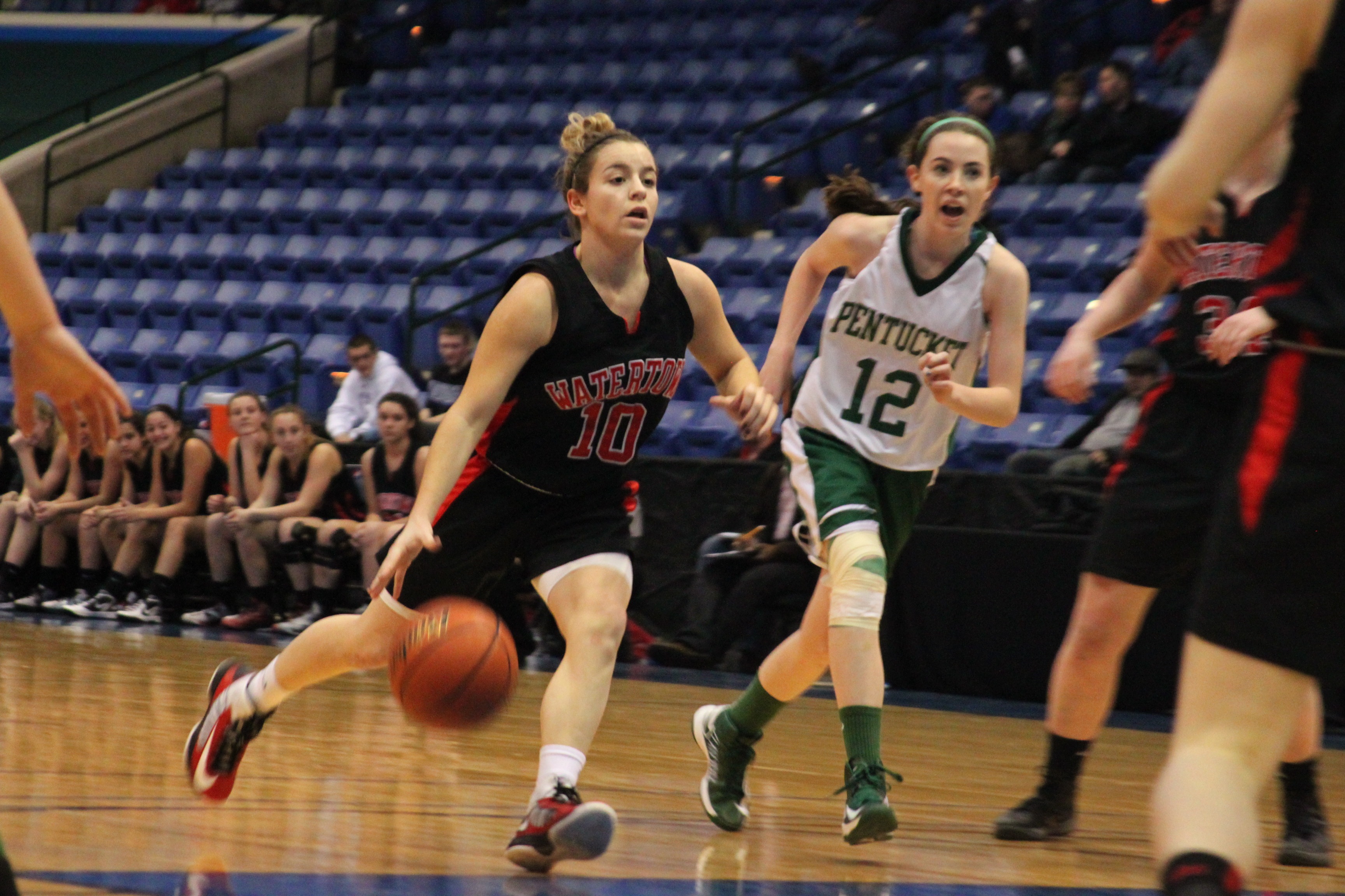 Watertown's girl's basketball team and Gabriella Coppola return to the North Section final for the second straight year. Here Coppola brings the ball up in the 2013 North Section Final against Pentucket. Photo by Charlie Breitrose