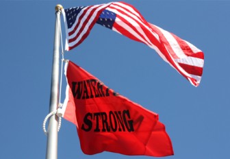 The Watertown Strong flag flies at Watertown High School in honor of Watertown's first responders.