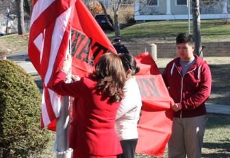 Students from the Transitions to Success program came up with the idea for the Watertown Strong flag and helped raise it for the first time on Thursday.