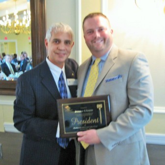 Watertown Boy's & Girl's Club Board President Paul DerBeoghosian thanks former President Brendon Kilcoyne for leading the club while searching for a new executive director.