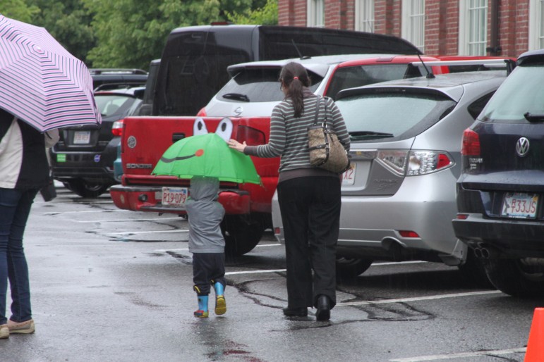 Despite the rain, many people ventured out to the opening day of the Watertown Farmers Market.