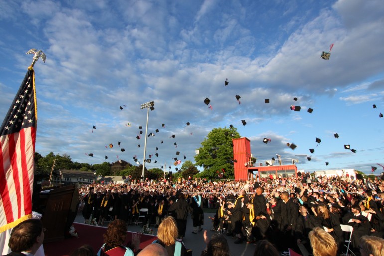 The Watertown High School class of 2014 celebrates graduating on Friday.