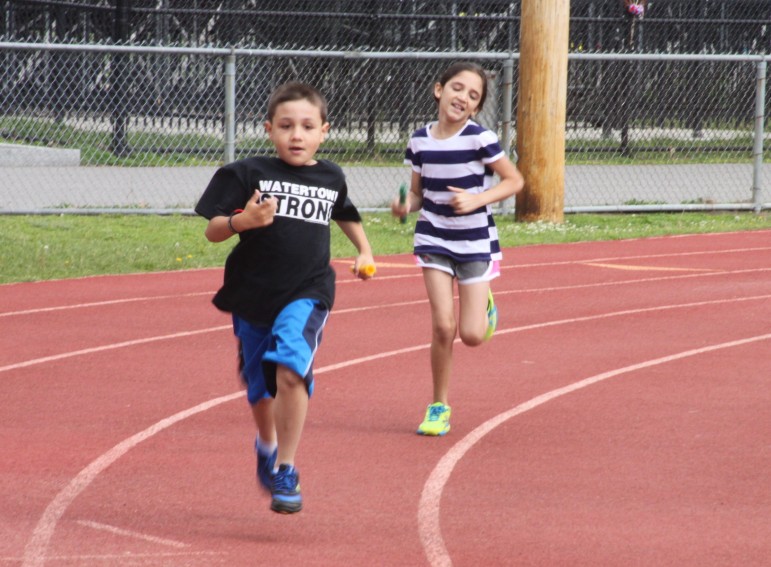 The third, fourth and fifth graders ran relay races and  took part in other events during the morning of the Lowell Field Day.