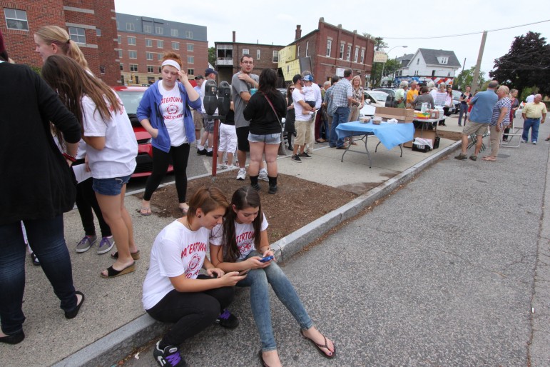 Students, parents and other fans of the mural gather on Baptist Walk for the dedication.