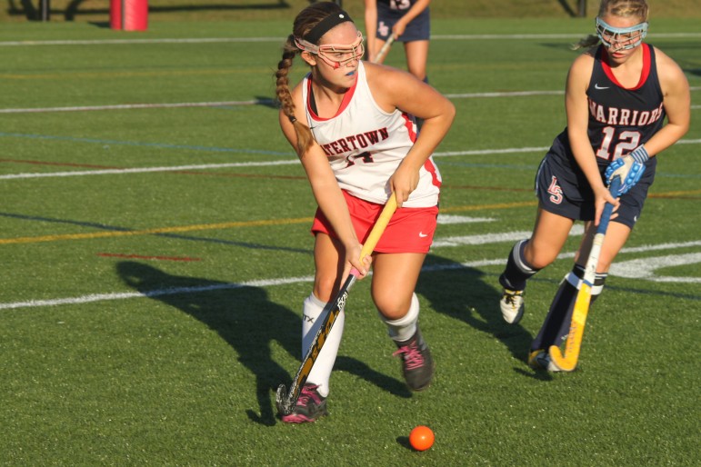 Watertown's Kourtney Kennedy looks for a teammate to pass to in the Raider's 7-0 win over Lincoln -Sudbury.