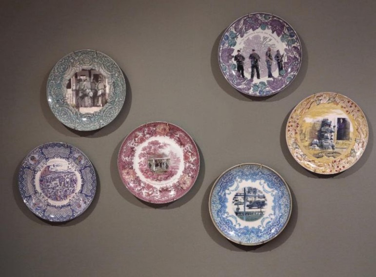 These commemorative plates recognizes the April 19, 2013 lockdown of thousands of Watertown residents, including the artists Mike Mandel and Chantal Zakari.