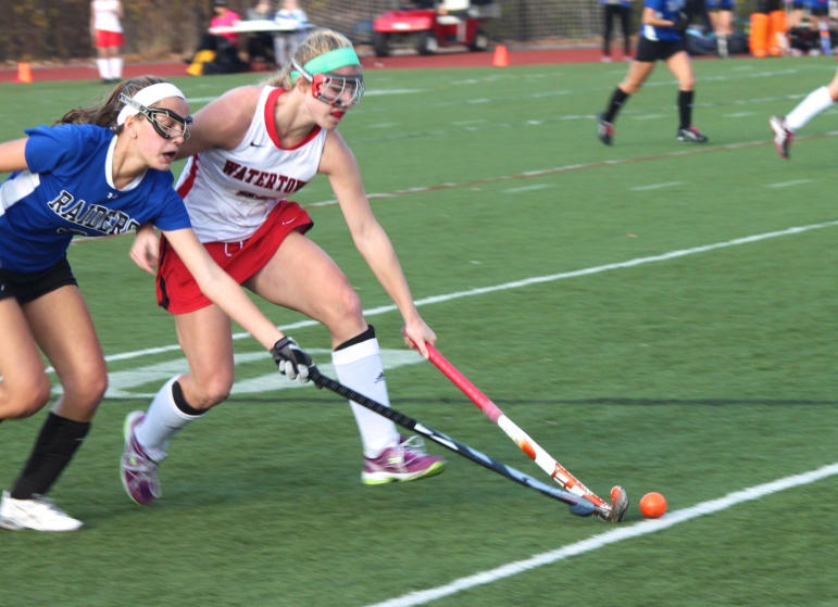 Watertown senior Rachel Campbell fights for the ball against Dover-Sherborn. Campbell scored the first goal in the state semifinal in Reading.