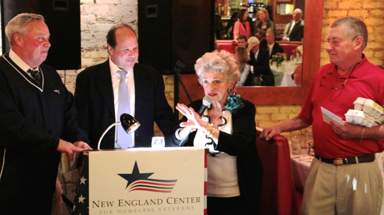 Sonia Boyajian spoke at the fundraiser for homeless vets on Oct. 28. She was joined by (left to right) Vietnam Vet Jack Callanan, Not Your Average Joe's Owner Stephen Silverstein, and Ron Blanchette, a Marine who served in Vietnam and is a former Belmont Police Chief.