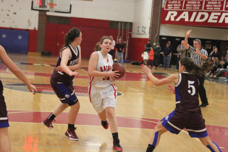 Watertown junior forward Katelyn Rourke drives to the hoop against Belmont.