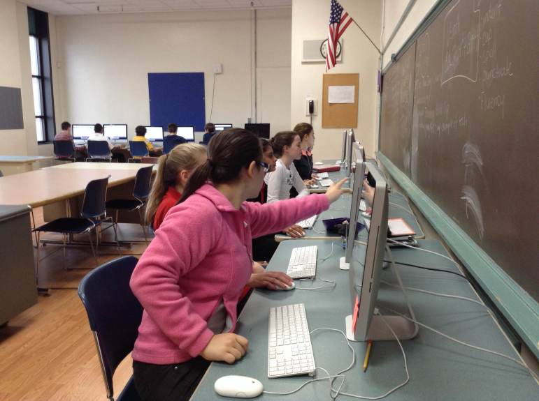 Watertown students learn how to program computers during the Hour of Code.