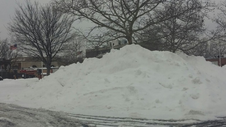 Snow removed from the parking lot behind CVS in Watertown Square.