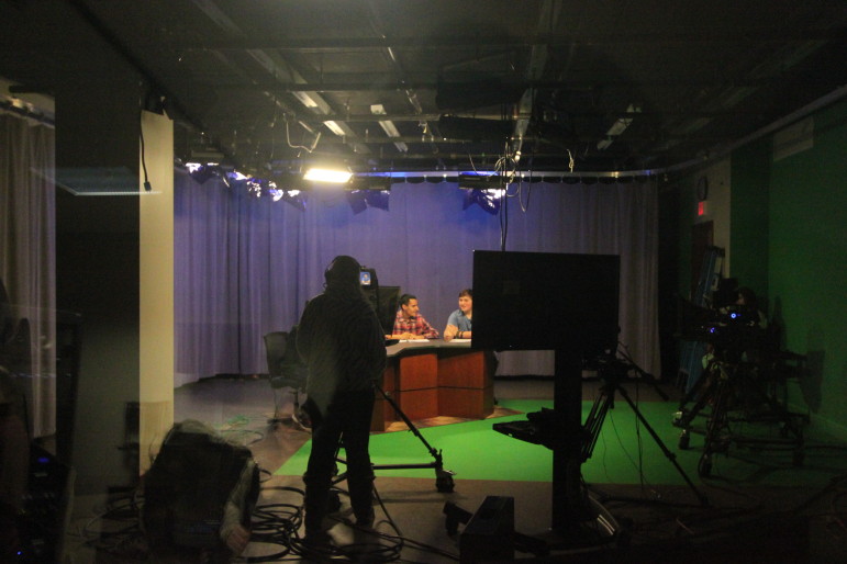 Watertown High School students shoot their own news panel show as part of their TV news production class.