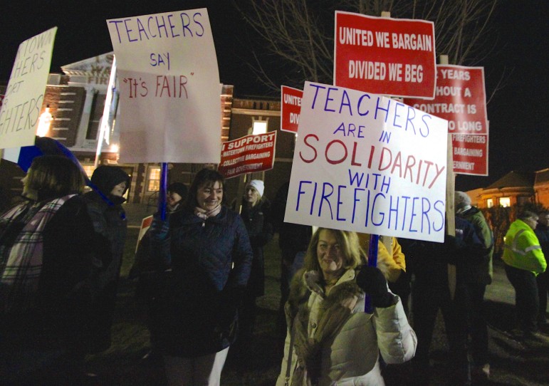 Members of the Massachusetts Teachers Association came out to support the Watertown Firefighters, including Watertown Education Association President Debra King, right.