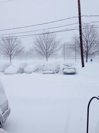 Snow blankets a parking lot in Waltham after the Feb. 15 blizzard.