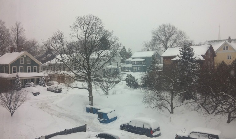 A blanket of snow covers the streets and more of Watertown in a storm that could drop another food of snow on town.