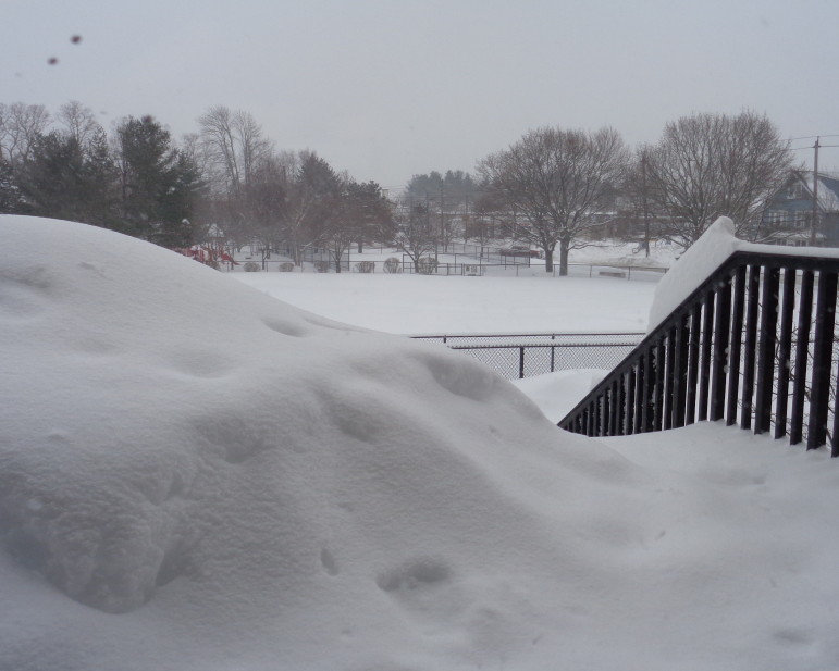 Snow piled up in front of the Apartments at Coolidge School. 