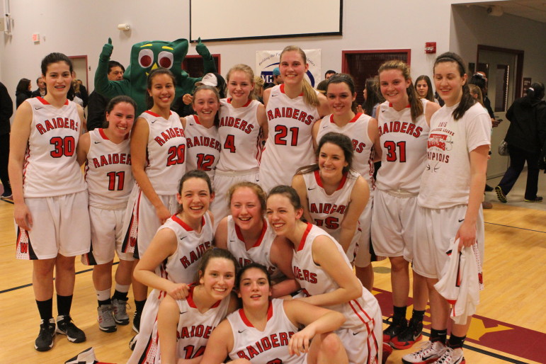 The Watertown girls' basketball team celebrates beating Belmont. Next up is Pentucket in the North Section final. 