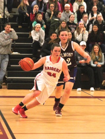 Junior Nicole Lanzo drives to along the baseline in the Raiders' 49-40 win over Belmont in the state tournament.