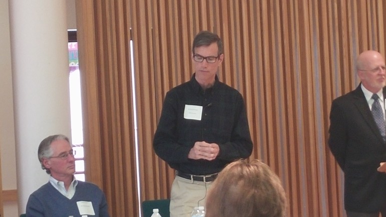 State Sen. Will Brownberger, center, speaks at "The Many Faces of Homelessness" forum in Belmont, as State Rep. Jonathan Hecht, left, listens. Watertown is part of the three community group that organized the forum.