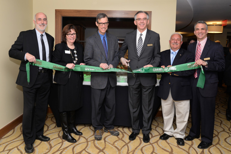 The ribbon cutting at the Residence at Watertown Square, (from L-R) LCB CEO Michael Stoller, Executive Director Sylvia Clarke, State Sen. Will Brownsberger, LCB President Stephen Puliafico, Town Council President Mark Sideris, and LCB Partner Lewis Pearlson.