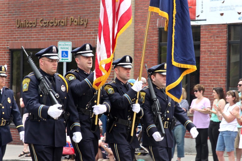 The Watertown Police Color Guard marches in the Memorial Day Parade.