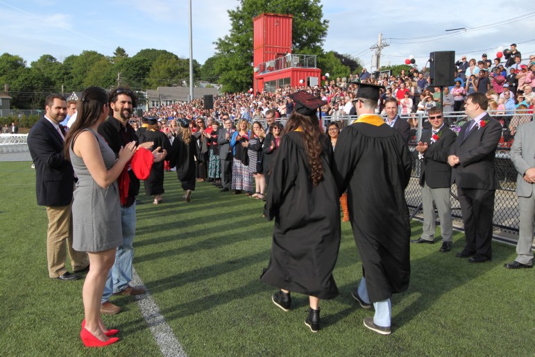 Watertown High School seniors walk into the graduation ceremony to the sounds of "Pomp and Circumstance."