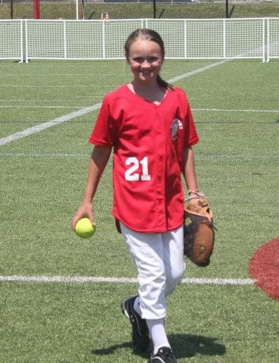 Watertown Youth Softball player Haley hit the winning grand slam in a 15-14 victory over Waltham.