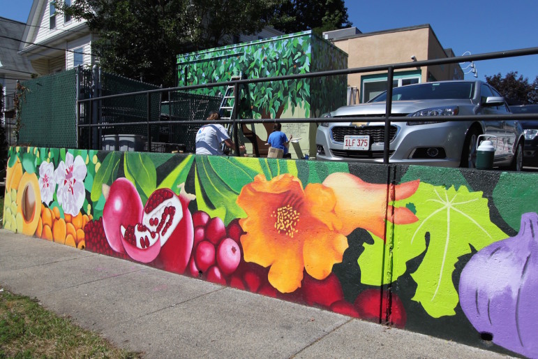 The new mural, Seeds of Change, that Watertown High School students painted at Uncommon Grounds.