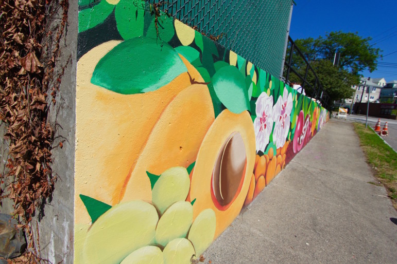 A view of the new mural in Coolidge Square looking up Melendy Avenue.