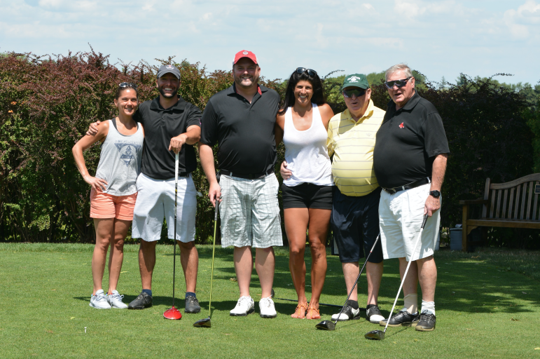 2015 Mugar Golf H+K from left to right: volunteer Jaime Messina, Dan Rivers, Brendon Kilcoyne of H+K Insurance, volunteer Elizabeth Calleva, Bob Kilcoyne and Jack Kilcoyne.