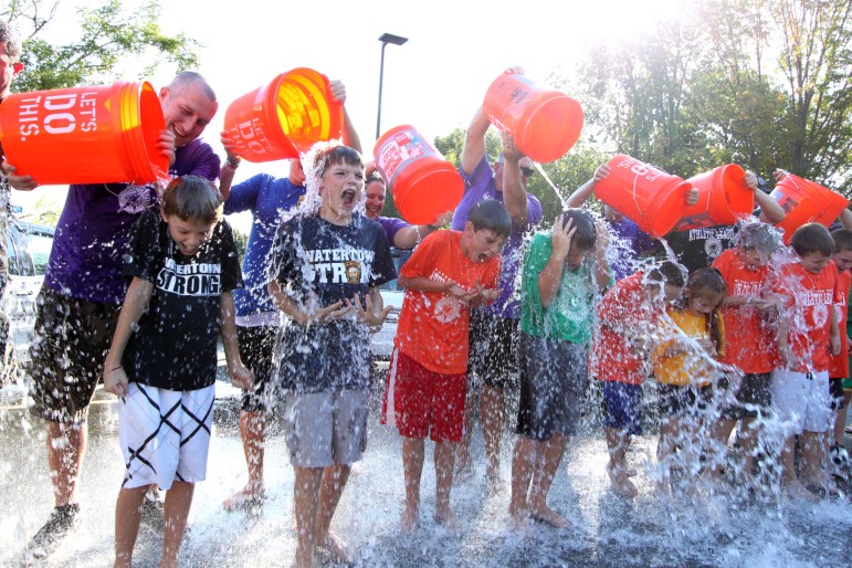After they gave their parents the ice bucket challenge, the children of the Watertown Police also took the ALS Ice Bucket Challenge.