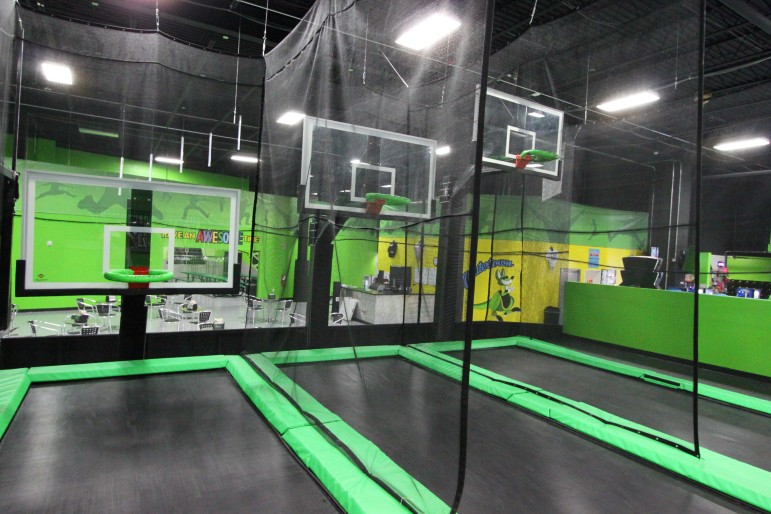 Jumpers have three hoops to choose from at Launch Watertown to try their hand at dunking a basketball.