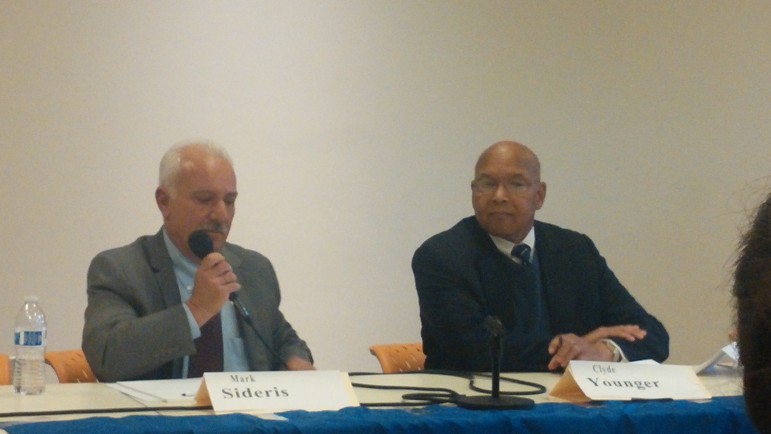 Candidates for Town Council President Mark Sideris, left, and Clyde Younger spoke at the League of Women Voter's Candidate Forum.