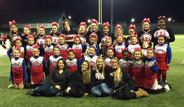 The Watertown High School and Watertown-Belmont Youth Cheerleaders pose with their coaches at the WHS game on Oct. 16.