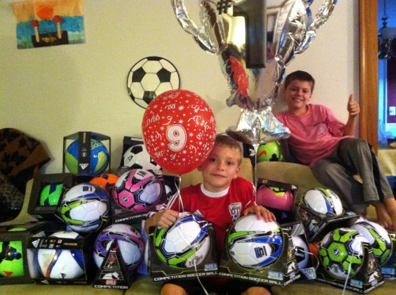Watertown's Brady Gleason collected soccer balls at his 9th birthday party and donated them to Children's Hospital. 