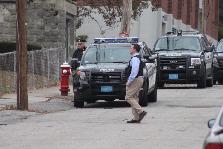 Police set up outside the building where a hostage situation was reported, but ended up being a false alarm.