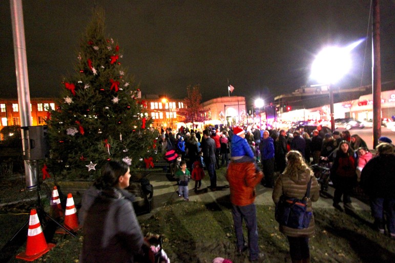 Hundreds packed the Watertown Square Delta to see Santa and the tree lighting.