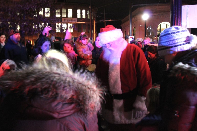 Santa Claus talks to children during the Watertown Tree Lighting Ceremony.
