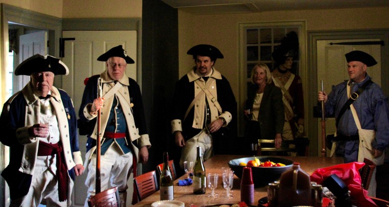 Members of the Watertown Provincial Guard celebrate after the ceremony inducting them into the Centennial Legion at the Edmund Fowle House.