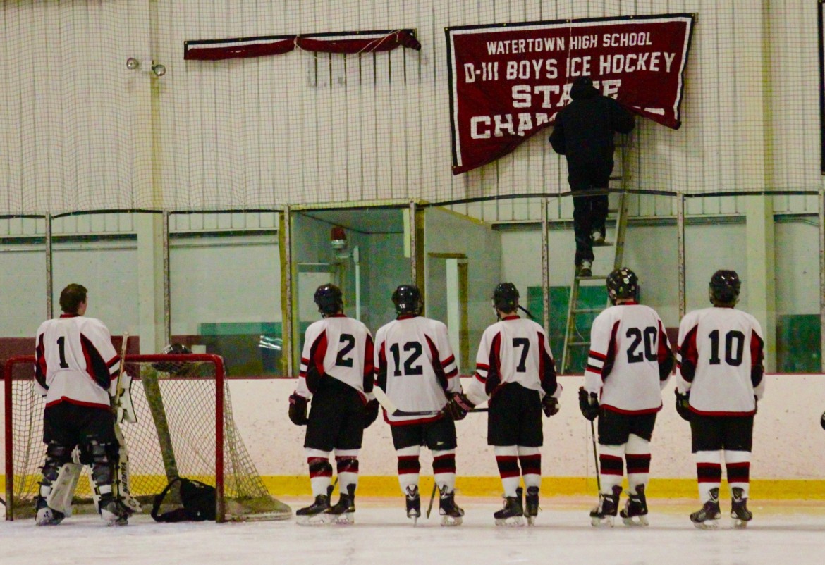 The banner for Watertown's 2015 state championship was unveiled at the John A. Ryan Arena Saturday.