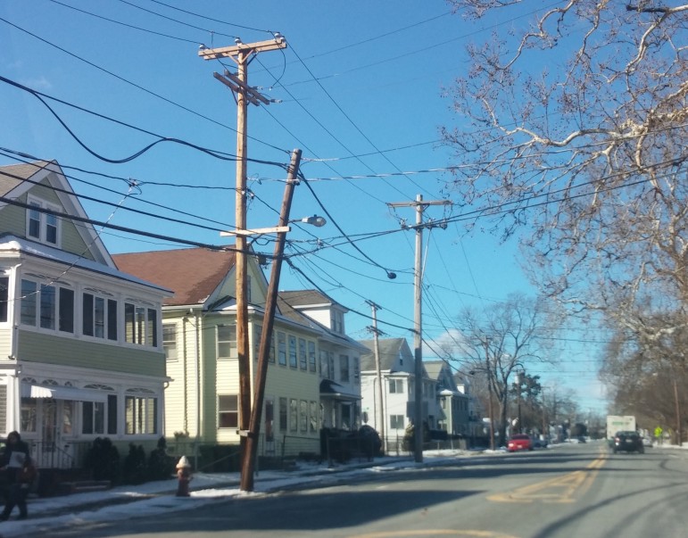 An example of a double utility pole on Main Street in Watertown