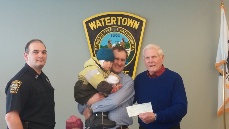 Watertown Police Officer Ken Swift, left, put the Heiniluomas in touch with Robert Faherty of Cops for Kids with Cancer, and the Watertown Police and Fire departments also raised money for Max, age 3.