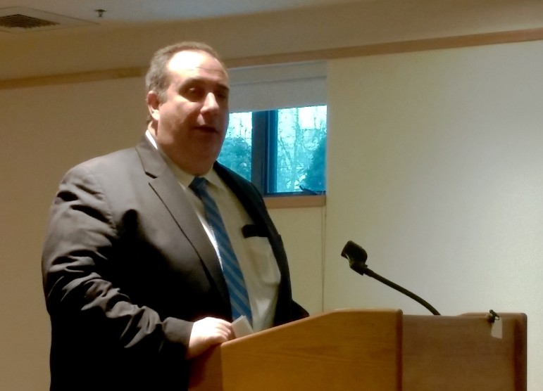 Gloucester Police Chief Leonard Campanello talked about his town's groundbreaking approach to fighting heroin and opiate addiction at the Watertown Library.