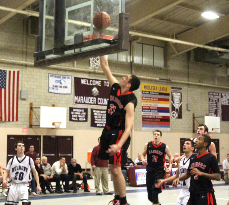 Watertown junior Jaden Hairston goes in for a layup against Belmont.