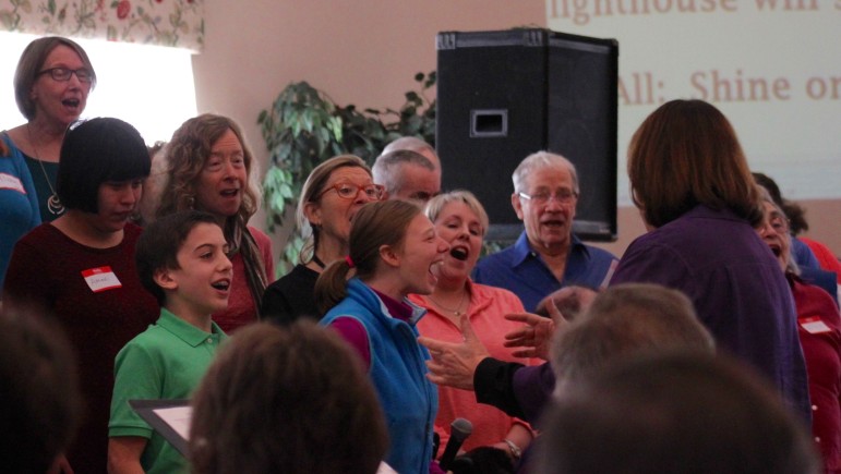 The Greater Boston Intergenerational Choir performed several songs during the Unity Breakfast.