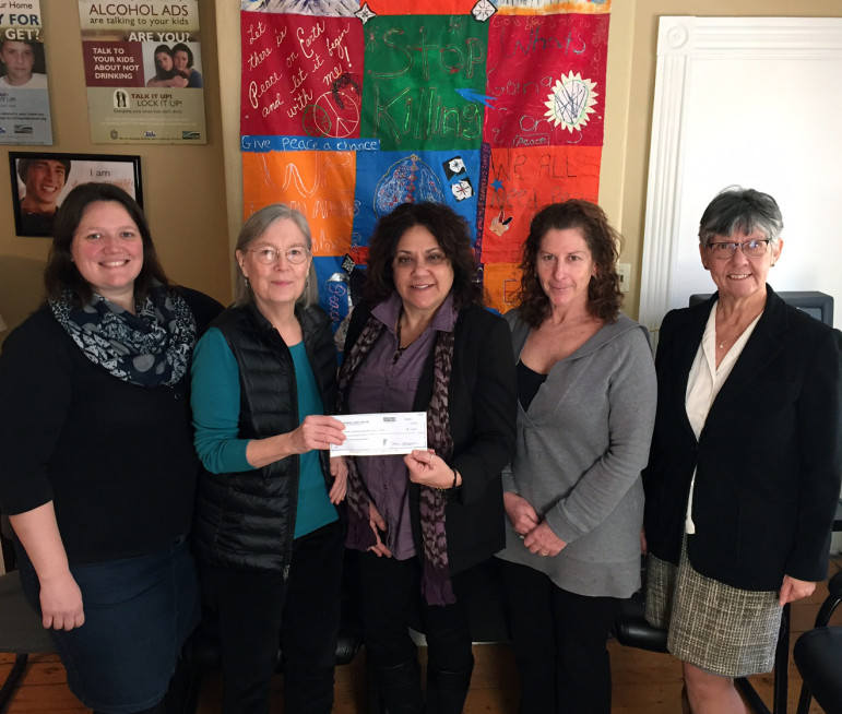 Marshall Home Fund Co-President Susan Flint presents Laura Kurman, Senior Program Director, Wayside Youth & Family Multi Service Center, with a check to support a new program, “Trainings for Older, Wiser Watertown Residents.” Pictured, from left: Danielle DeMoss, Social Service Resource Specialist for the Town of Watertown (Wayside staff); Flint; Kurman; Stephanie Sunderland, Mental Health First Aid Project Coordinator (Wayside); and MHF Co-President Carole Katz.