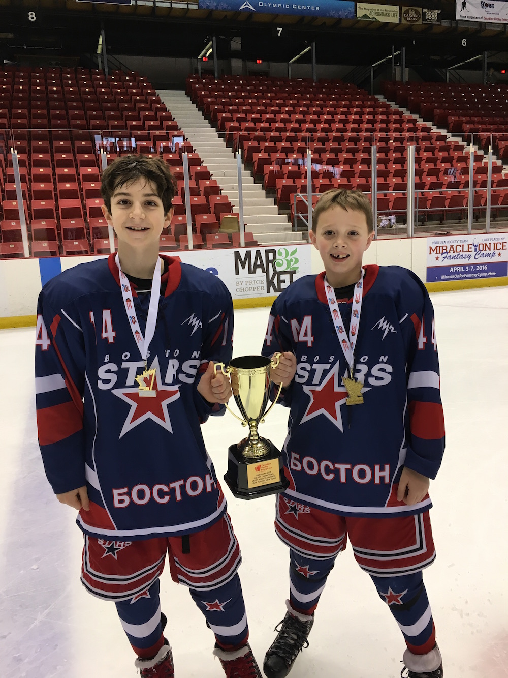 Youth hockey players Matthew Brown, left, and James O'Connor brought home gold medals from a Squirt hockey tournament in Lake Placid, N.Y.