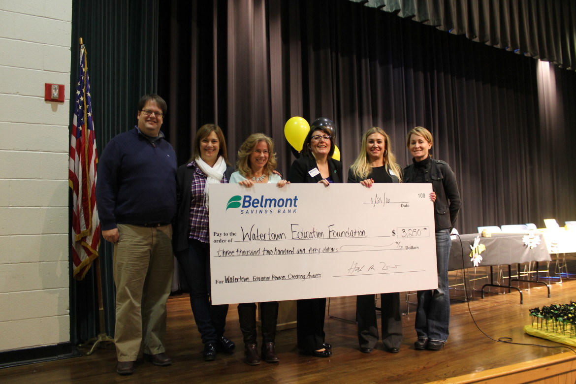 Belmont Savings presented a $3,250 check to the Watertown Education Foundation during the spelling bee. Pictured, from left, Kimo Carter, Watertown Middle School Principal; Elaina Griffin, Co-President of Watertown Education Foundation; Candace Miller, School Committee Member ; Lisa Morrissey, Belmont Savings Banker in Watertown; Tyler Britland, Belmont Savings Branch Manager in Watertown; Amy Donahue, Co-President of Watertown Education Foundation.