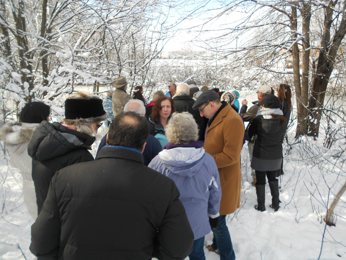A group of Watertown residents toured Walker Pond as part of the kickoff event for the Invest in Watertown group.