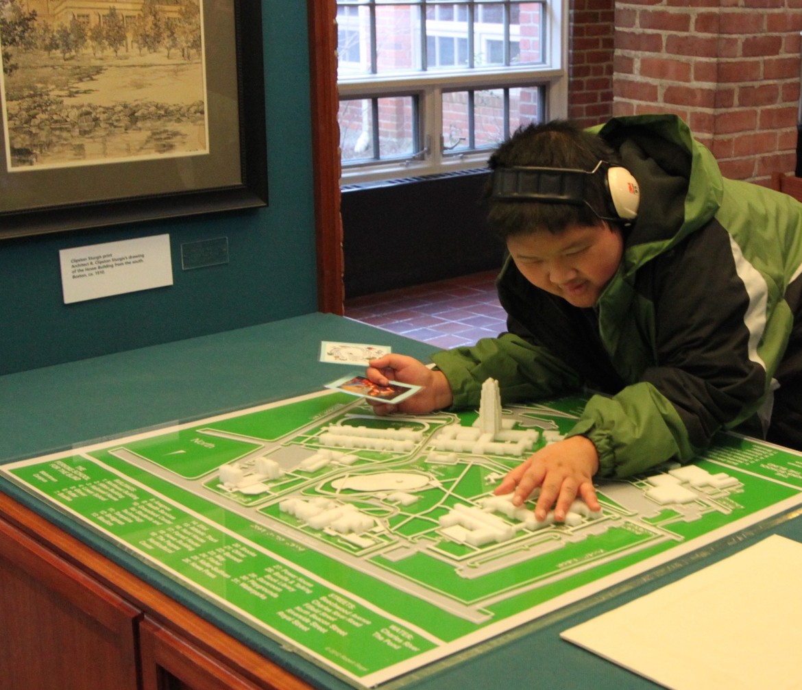 A Perkins School for the Blind students explores a 3D map of the school campus in the Howe Building.